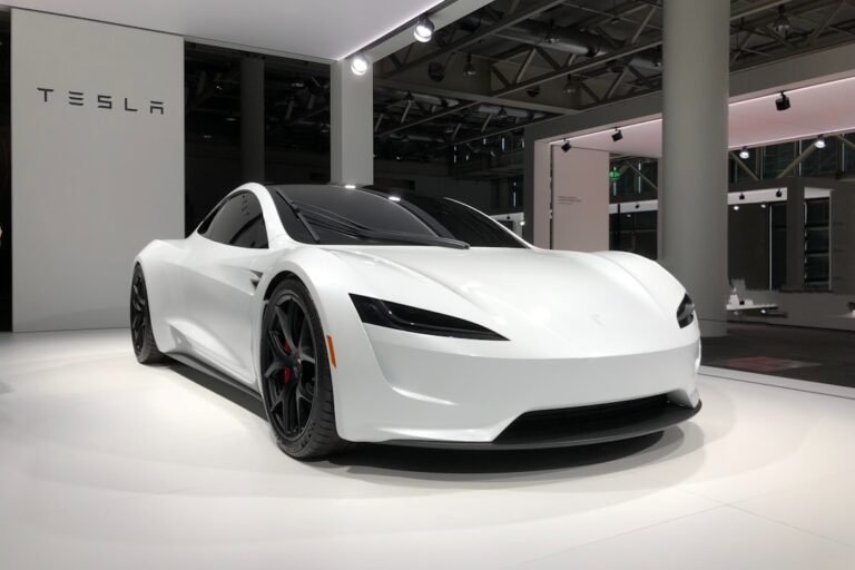 nikola tesla o inventor - white lamborghini aventador parked in building